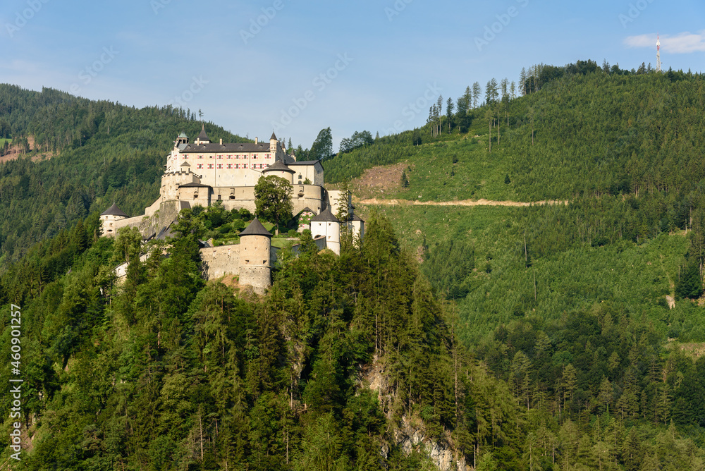 Hohenwerfen castle and fortress on top of the hill and surrounded by the high mountains of the Alps, Werfen, Salzburg, Austria