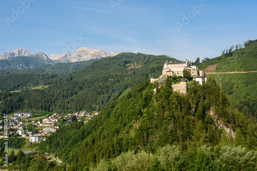 Hohenwerfen castle and fortress on top of the hill and surrounded by the high mountains of the Alps, Werfen, Salzburg, Austria photo