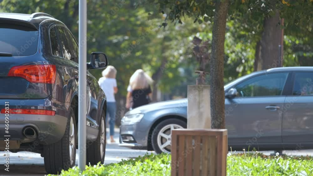 Close up of a car parked illegally against traffic rules on pedestrian city street side. Close up of a car parked illegally against traffic rules on pedestrian city street side.