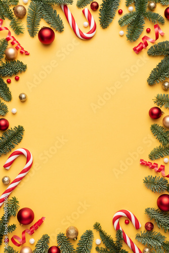 Christmas card with ornament frame on yellow background