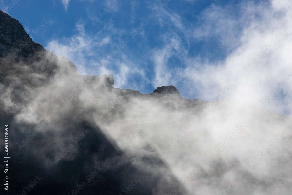 landscape with clouds on top of mountain ridges landscape with clouds on top of mountain ridges