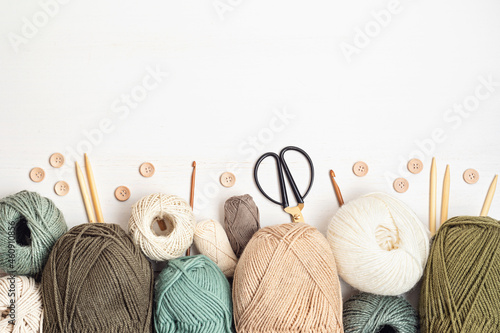 Craft hobby background with yarn in natural colors Fototapeta