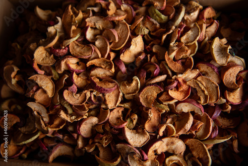 A bunch of sliced dry apple. Dried fruit texture.