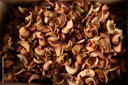 A bunch of sliced dry apple. Dried fruit texture.