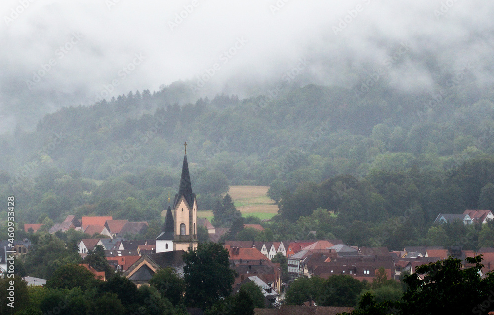 View of Ebermannstadt in Franconian Switzerland in thick fog