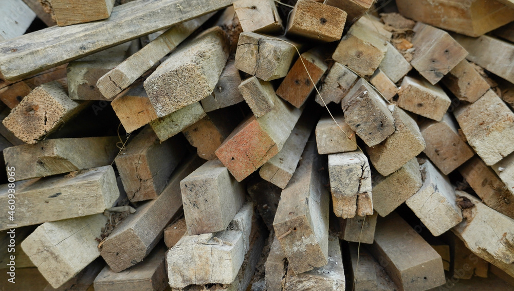 the pile of the construction wood. the chopped wood for construction, and wooden furniture. a versatile lumber for many needs. the pile of the construction wood. the chopped wood for construction, and wooden furniture. a versatile lumber for many needs.