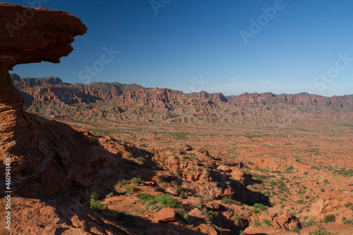 Red Sandstone canyon. Panorama view of the arid desert mountains and valley.
