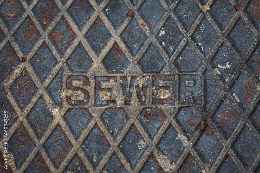 Metal cover to underground sewer