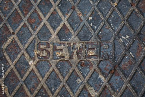 Metal cover to underground sewer