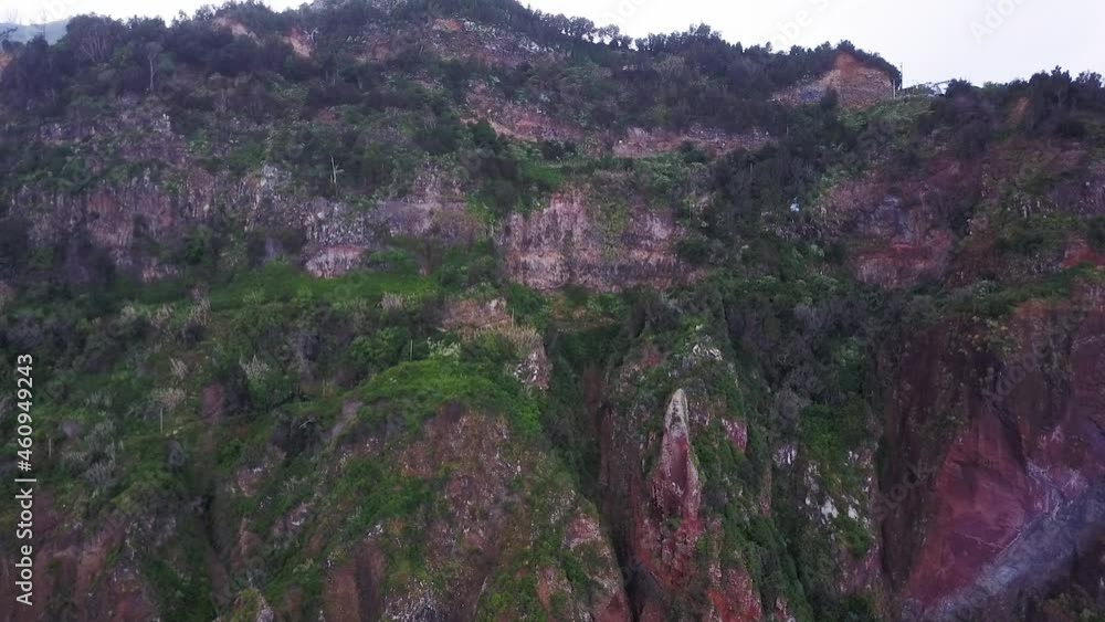 Rocky mountain cliff of Rocha do Navio in Madeira -Aerial approach Rocky mountain cliff of Rocha do Navio in Madeira -Aerial approach