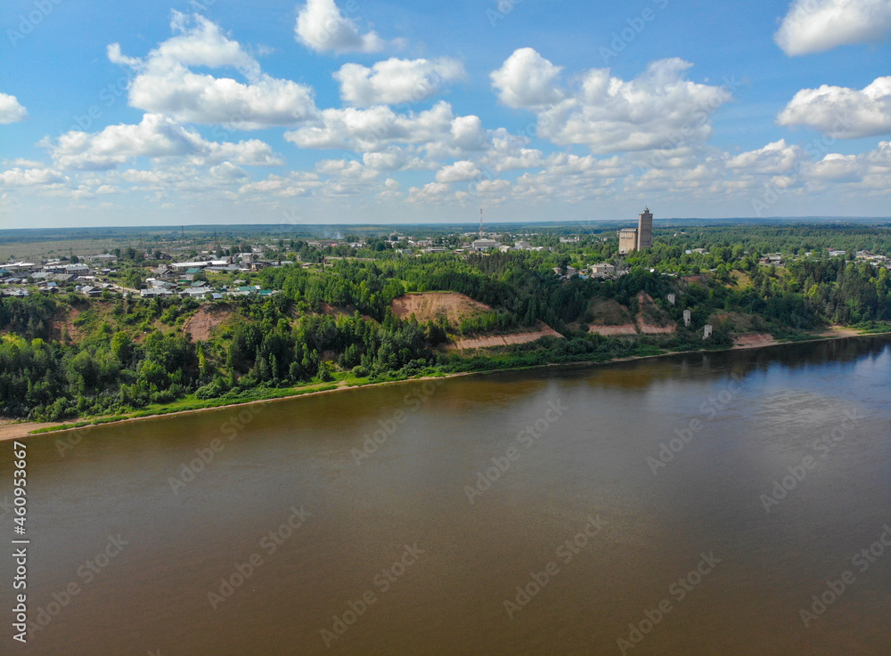 Aerial view of the high bank of Vyatka and a grain elevator (Kotelnich, Kirov region, Russia)