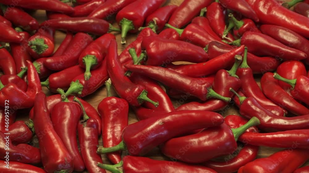 Ripe red chili peppers grown in New Mexico are a culinary delight in the USA. They are a delicious part of Mexican food in the North American southwest. Ripe red chili peppers grown in New Mexico are a culinary delight in the USA. They are a delicious part of Mexican food in the North American southwest.