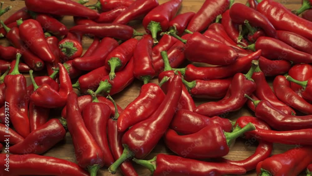 Ripe red chili peppers grown in New Mexico are a culinary delight in the USA. They are a delicious part of New Mexican food in the North American southwest. Ripe red chili peppers grown in New Mexico are a culinary delight in the USA. They are a delicious part of New Mexican food in the North American southwest.