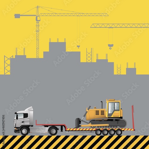 Transportation of a bulldozer on a low loader. Construction machinery on the background of a building under construction.