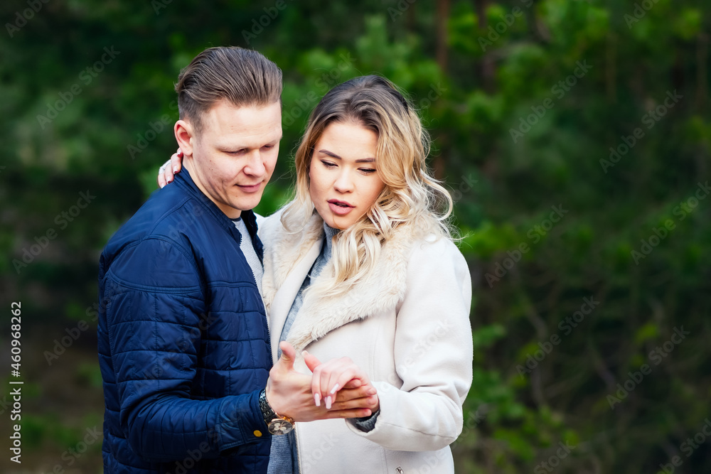 Fototapeta premium Happy loving couple enjoying of happiness love and tenderness, dating, romance.Couple hugging in love at spring park.