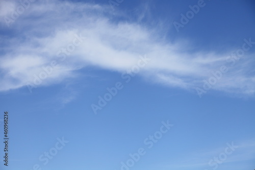 Clear blue sky with white beautiful Cumulus cloud at Sunny spring morning close up stratosphere view background texture for weather report copy space