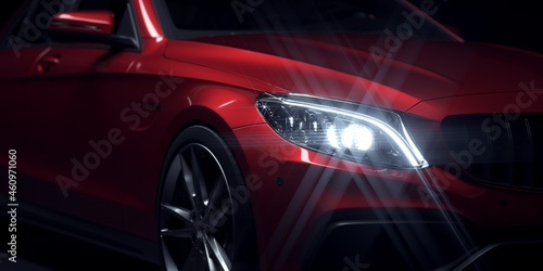 Close up of red sports car headlight. © Negro Elkha