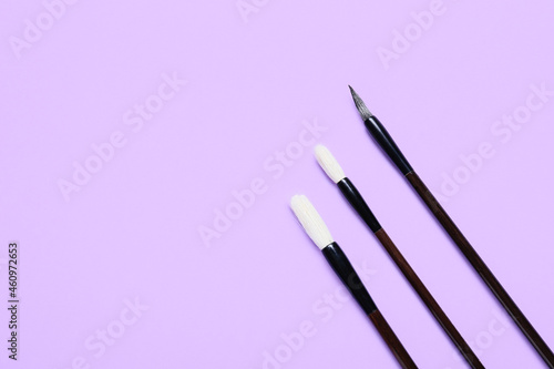 Calligraphic brushes on lil...