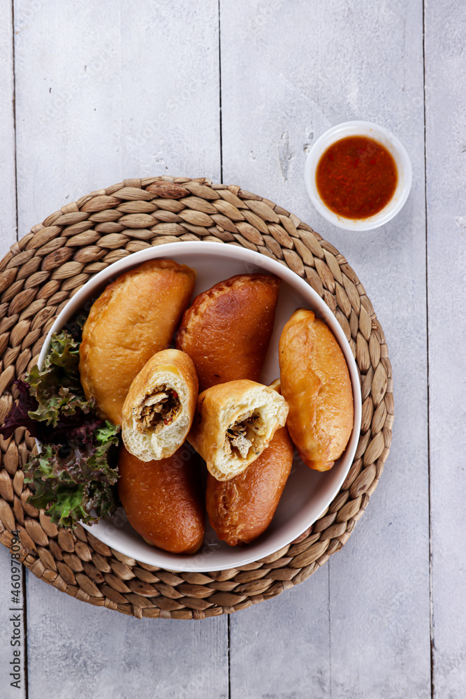 Panada is a fried bread filled with spicy tuna, a traditional snack ...