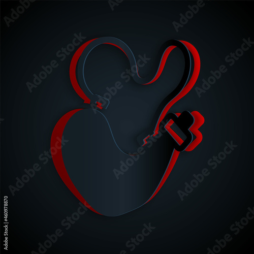 Paper cut Spanish wineskin icon isolated on black background. Paper art style. Vector