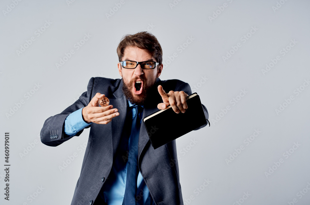 emotional man in a suit investment economy virtual money light background emotional man in a suit investment economy virtual money light background