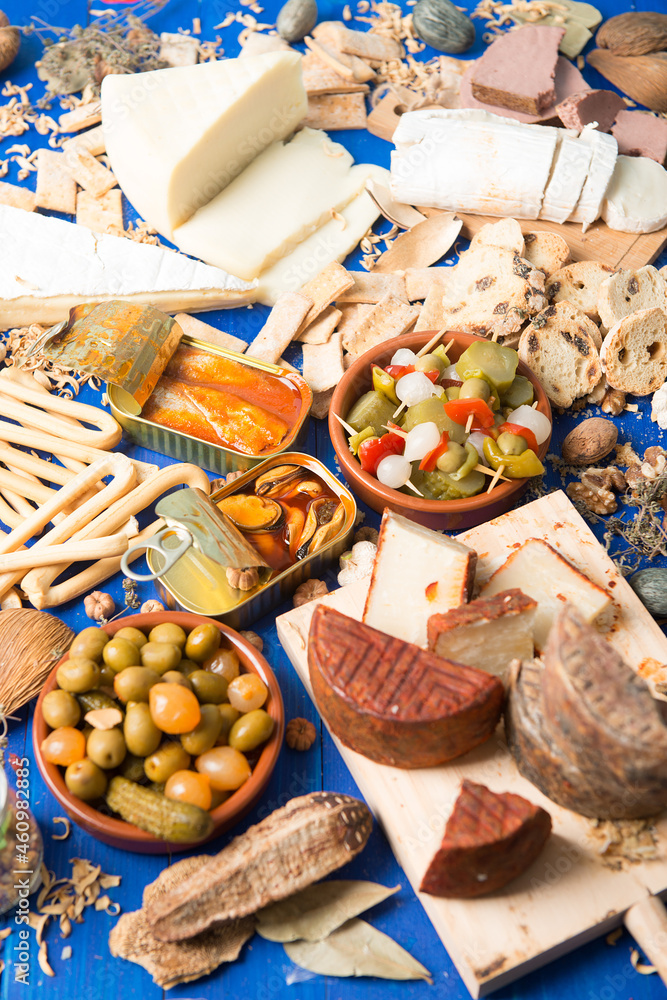 Assorted table of typical Spanish tapas to share with friends 