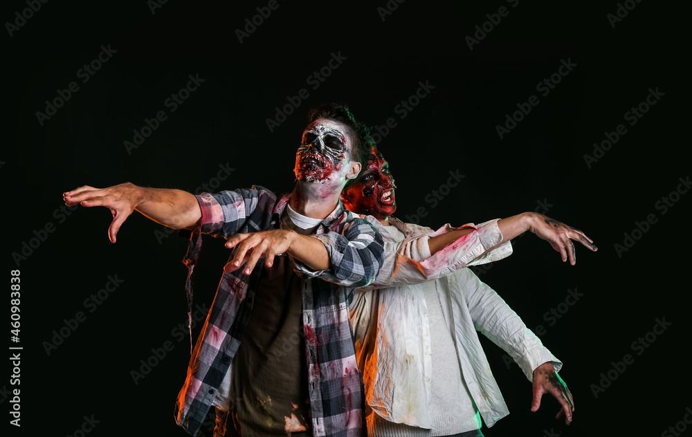 Fototapeta premium Scary zombies on dark background