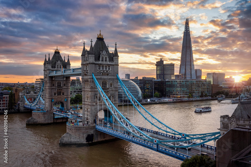 Beautiful sunset view to the Tower Bridge of London with the skyline along the Thames river  United Kingdom