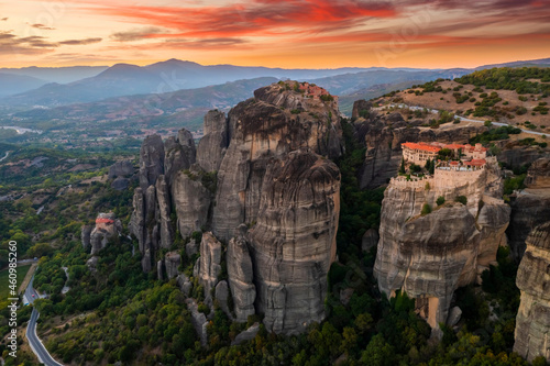 Mountain monastery and rocks in Meteora at sunset. Greece.