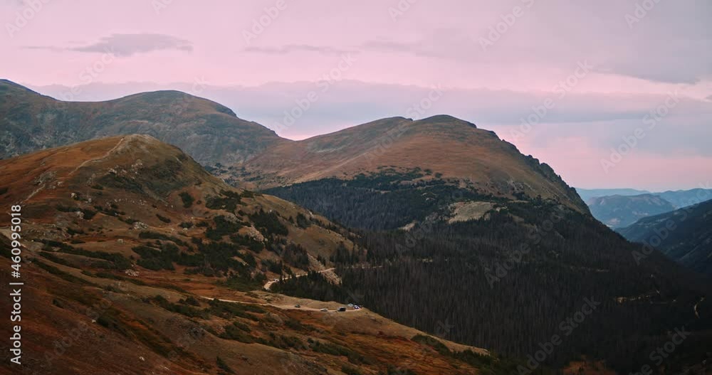 Pan over beautiful mountainous landscape in rocky mountain national park. Deep valleys, impressive rises, and windy mountainous road. Pan over beautiful mountainous landscape in rocky mountain national park. Deep valleys, impressive rises, and windy mountainous road.