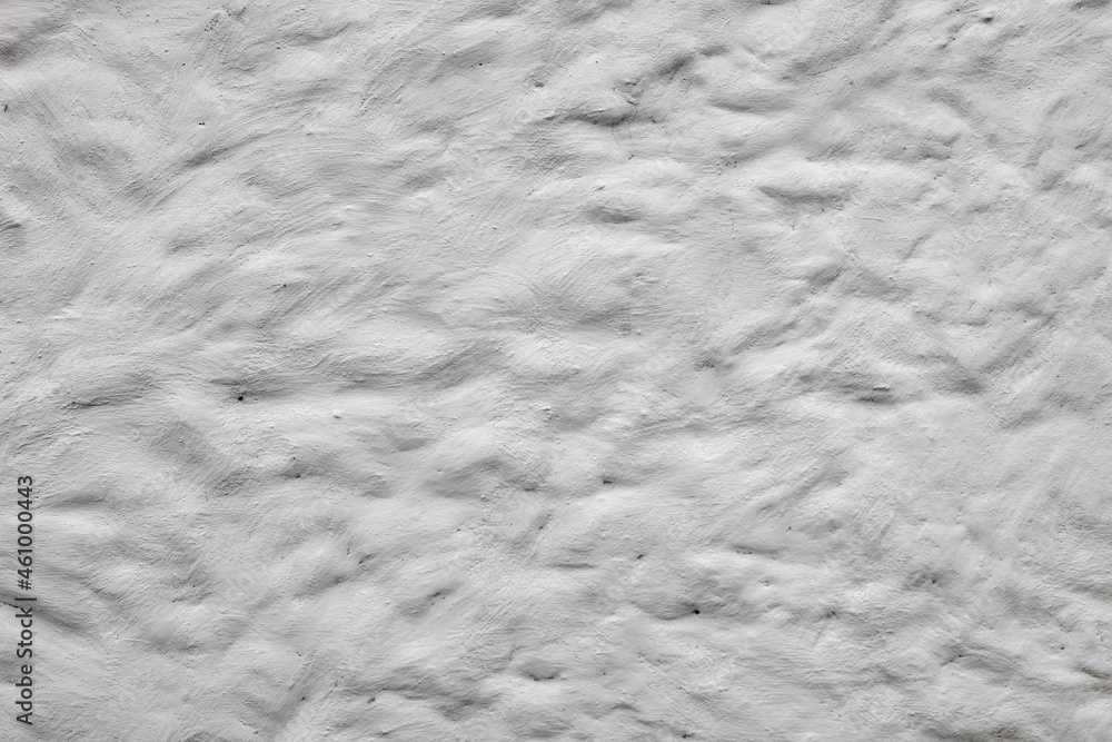 Białe tło z wgłębieniami. Ściana pokryta farbą z widoczną fakturą - obrazy, fototapety, plakaty 