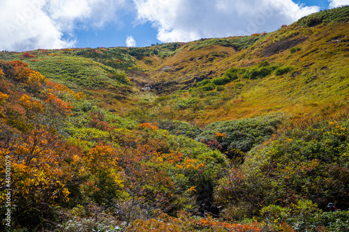                                                                                                                                              A view of climbing Mt. Kurikoma in Kurihara City  Miyagi Prefecture  Yuzawa City  Akita Prefecture  during the autumn foliage season.