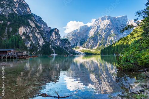 Small beautiful lake in Italian Alps. Pragser Wildsee or Lago di Braies and mountain range of Croda del Becco or Seekofel and Sasso del Signore. Dolomites, Trentino-Alto Adige, Italy, Europe.