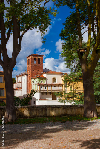 San Ponziano (St Pontianus) old church with medieval brick bell tower seen from Lucca walls public park photo