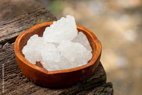 Crystalline sugar crystals on nature background.