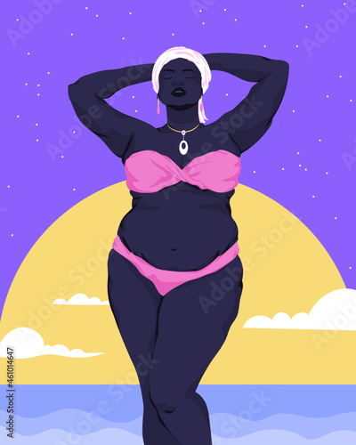 Plus size woman relaxing at the beach