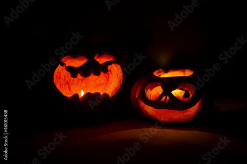 Pumpkins decorated with faces with eyes and mouths