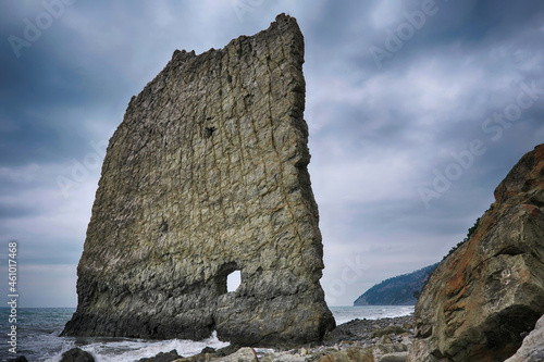 Sail Rock (Parus Rock) on cloudy winter day. Praskoveevka, Black Sea,  Krasnodar Krai, Russia. photo