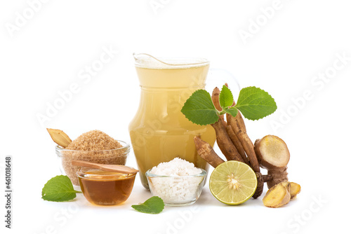 Herbal drink with ginger root ,fingerroot,coleus amboinicus leaves,sea salt,brown sugar ,lemon and honey. photo
