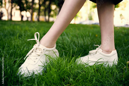female feet grass park fresh air walk