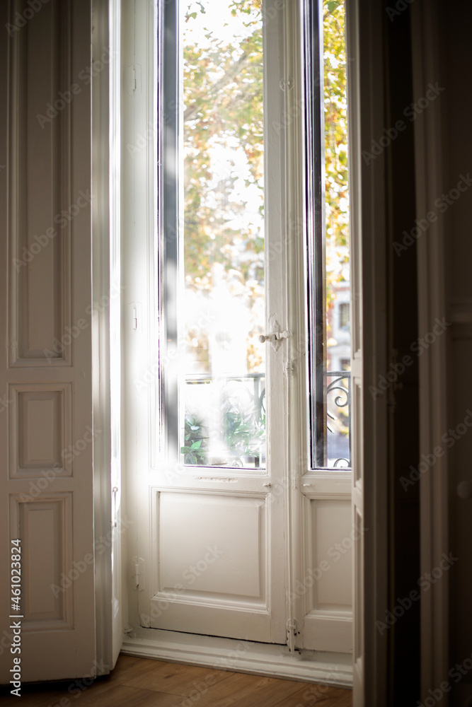 Fototapeta premium antique white wooden window down to the floor