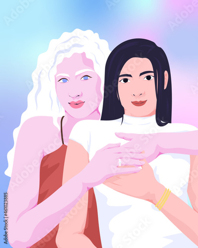 Portrait of two young gay women embracing
