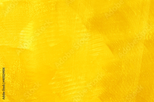 Abstract yellow texture of brushed steel background