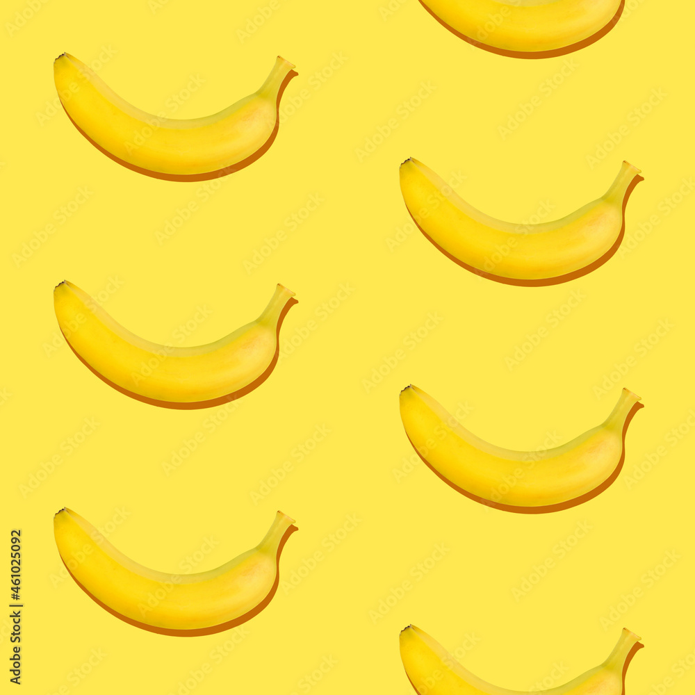 Seamless pattern of bananas on yellow background