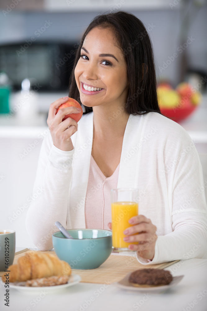 happy woman having healthy breakfast happy woman having healthy breakfast