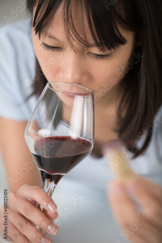 close view of woman drinking red wine