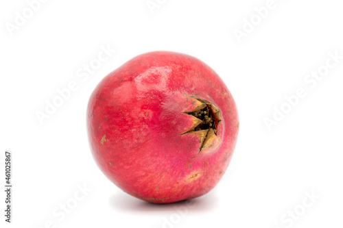 ripe fruit from pomegranate on white background