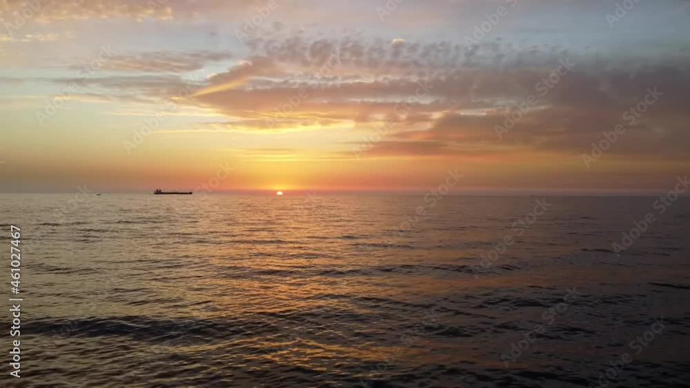 Beautiful fiery sun sinking in the horizon in batroun, Lebanon -Aerial Beautiful fiery sun sinking in the horizon in batroun, Lebanon -Aerial