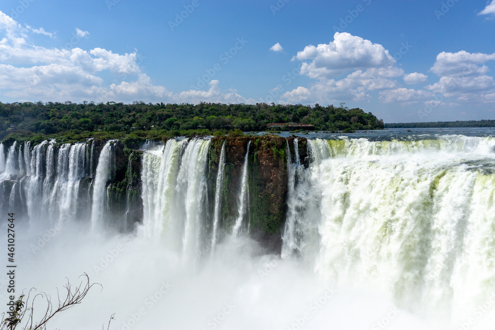 Iguazu Falls, located on the border of Argentina and Brazil, is the largest waterfall in the world. Iguazu Falls, located on the border of Argentina and Brazil, is the largest waterfall in the world.
