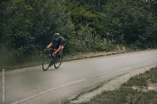 Fototapeta Naklejka Na Ścianę i Meble -  Sportsman spending leisure time for cycling outdoors